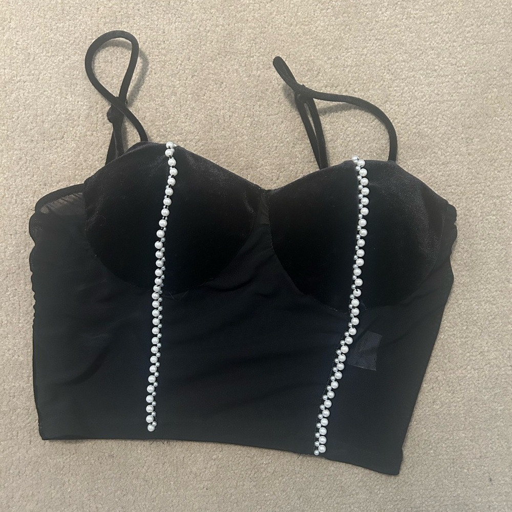small mesh velvet tank fits about an A cup adjustable straps